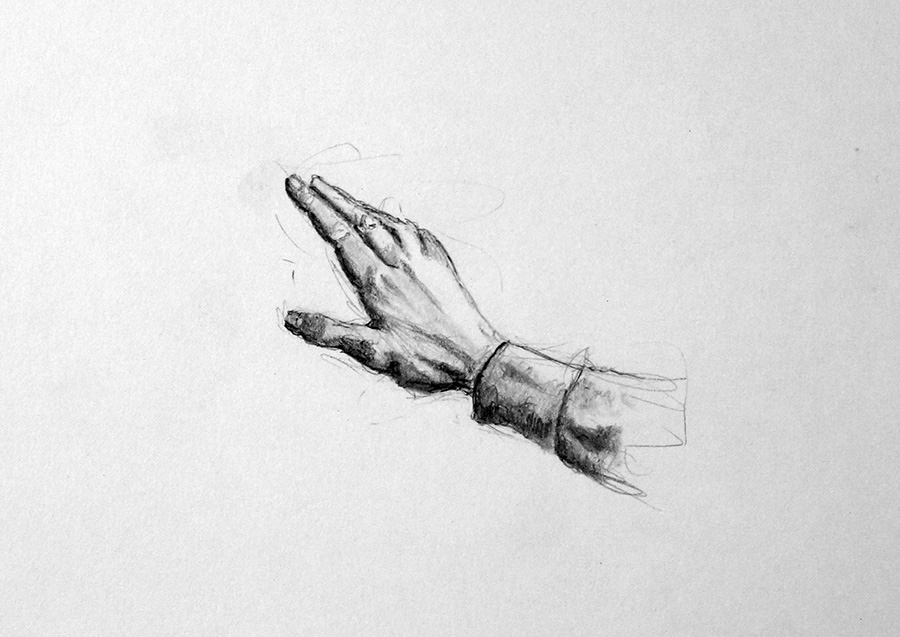 Approaching an intersection I see a man waving; catty-corner outside the&nbsp;subway…